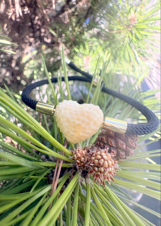 Armband mit facettierten Bernstein in Herzform