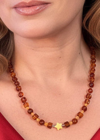 Schöne Halskette in Cognac transparent mit Stern