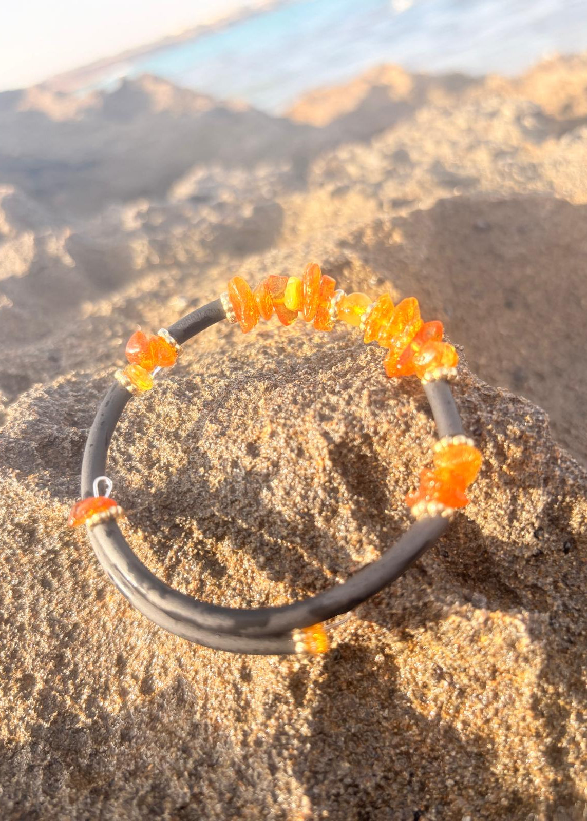 MinAmber Wickelband Bernstein Unisex